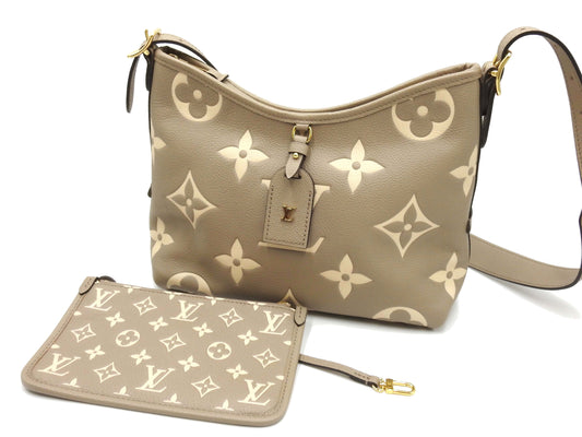 LOUIS VUITTON Monogram Empreinte Carryall Zip NM PM Dove Cream M47180
