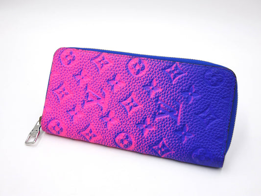 LOUIS VUITTON Monogram Illusion Zippy Wallet Vertical NM Blue Rose M81243