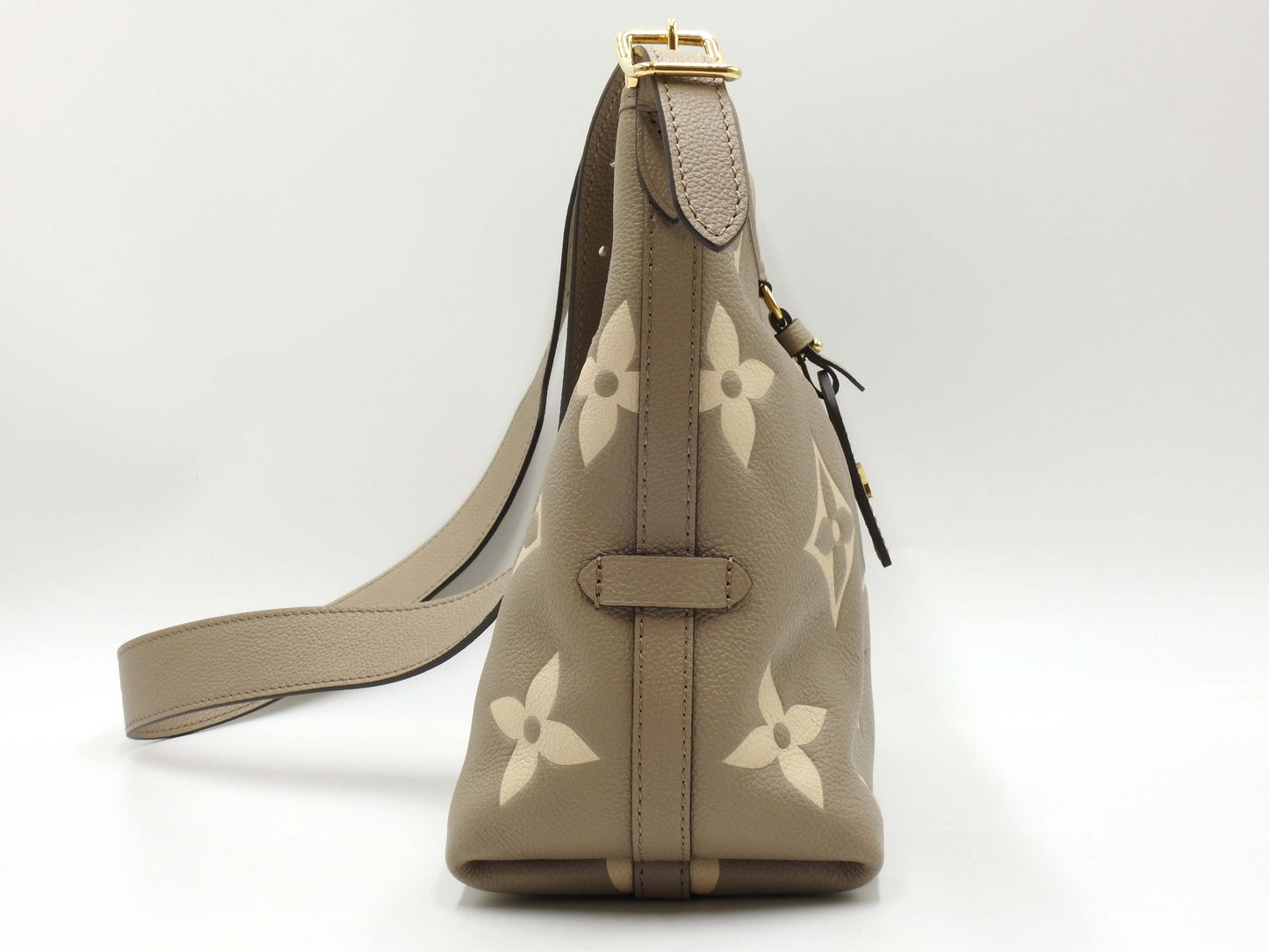 LOUIS VUITTON Monogram Empreinte Carryall Zip NM PM Dove Cream M47180