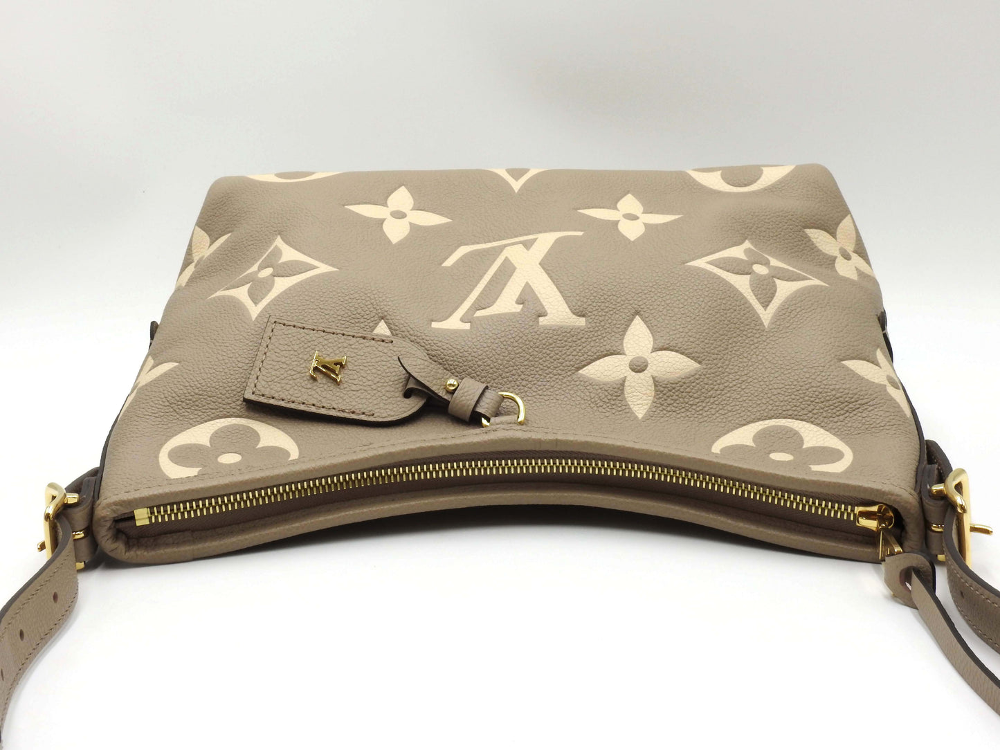 LOUIS VUITTON Monogram Empreinte Carryall Zip NM PM Dove Cream M47180