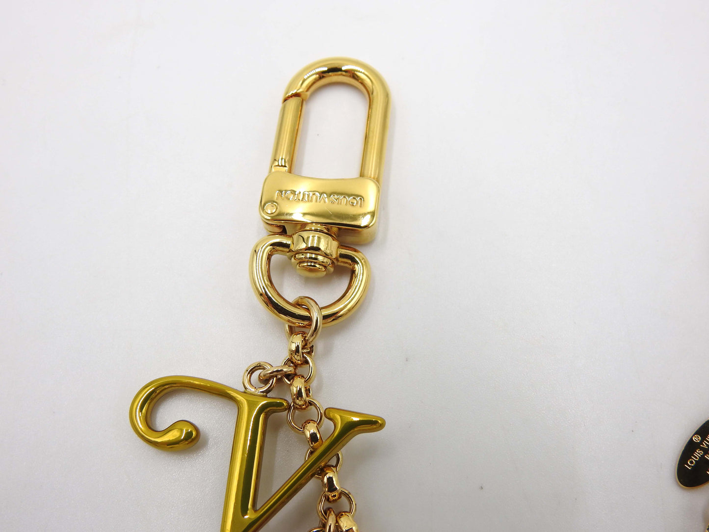 LOUIS VUITTON New Wave Chain Bag Charm Gold Multicolor M63748
